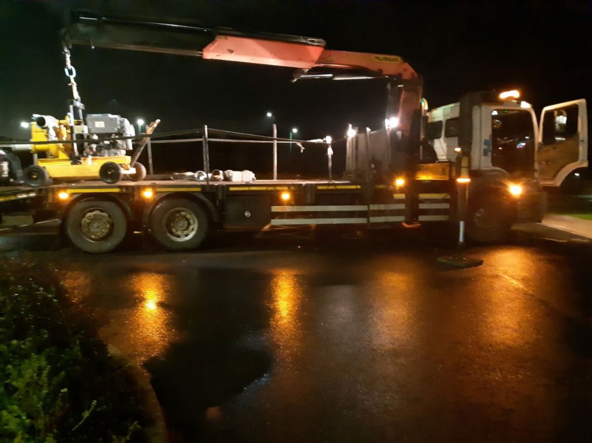 Selwood S150 pump on back of lorry being delivered to flood at crematorium site