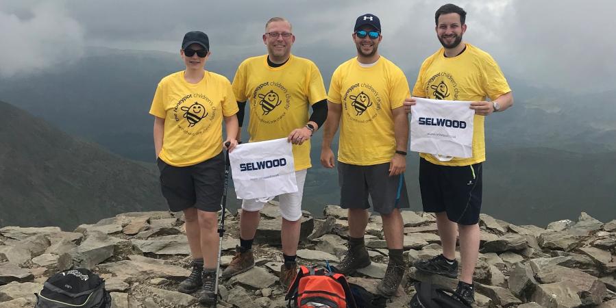 The Selwood team climbed Mount Snowdon to raise thousands of pounds for charity